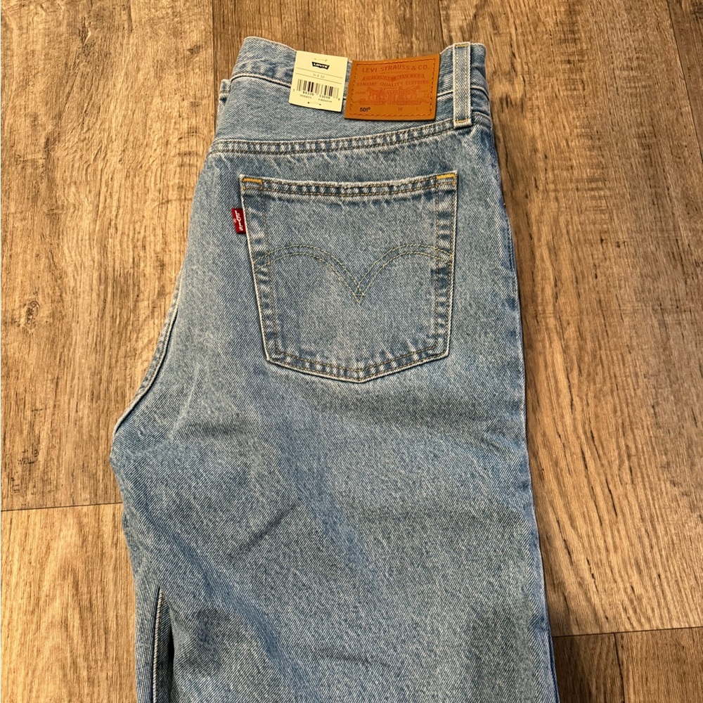 Levi’s jeans, button fly